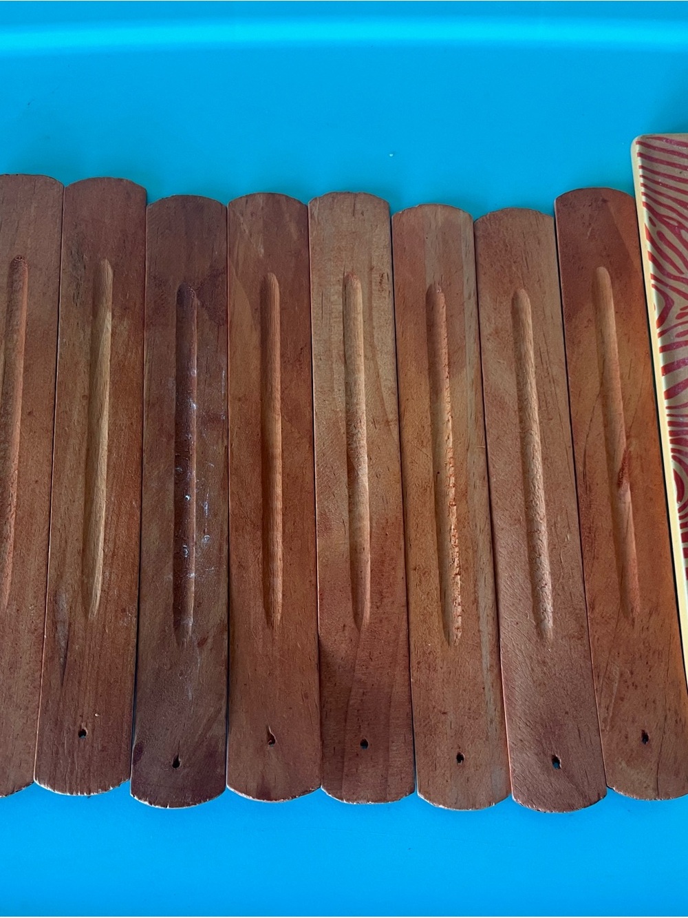 Wooden incense stick holders